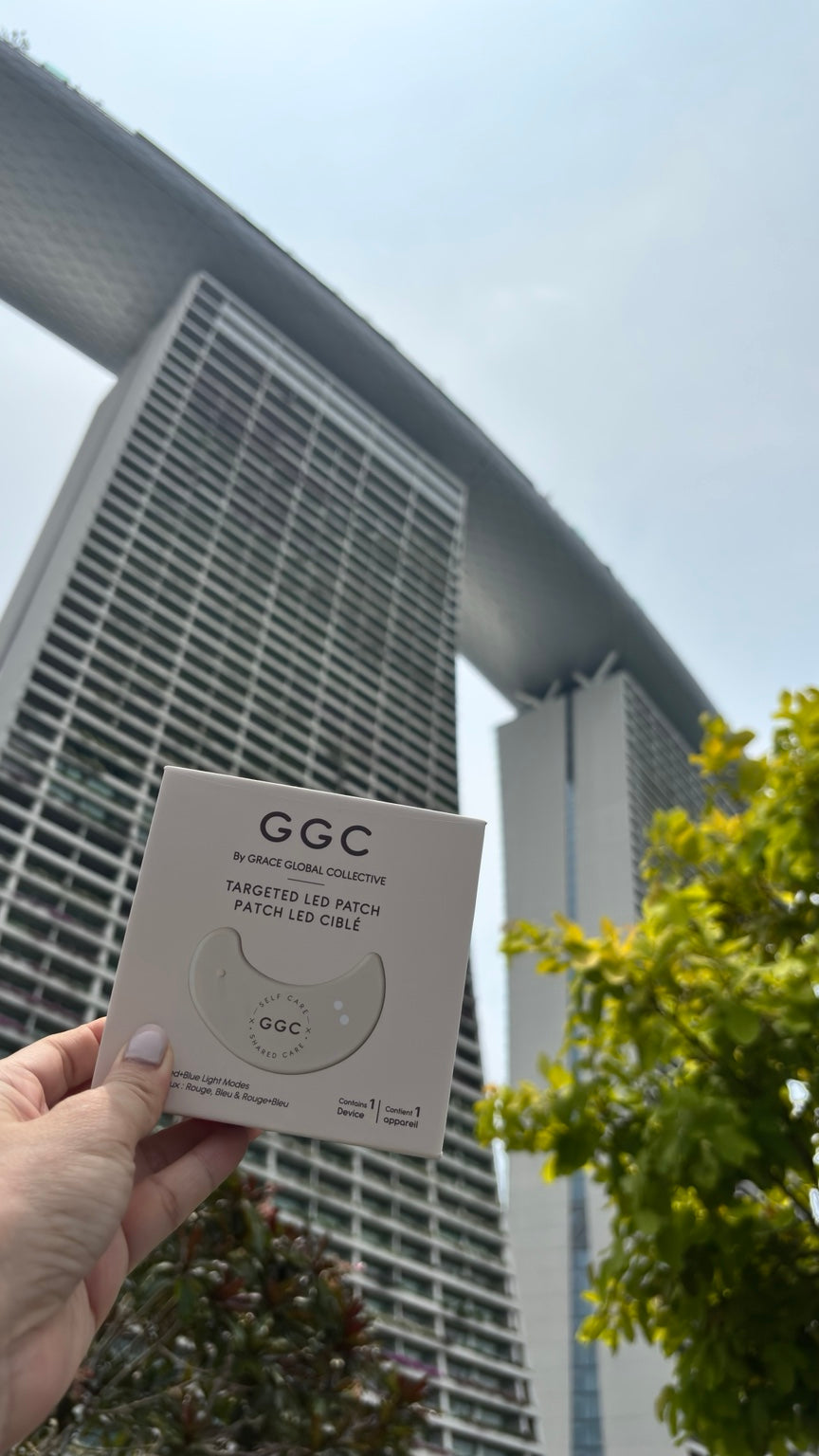 GGC Targeted LED Patch packaging held in front of Marina Bay Sands in Singapore