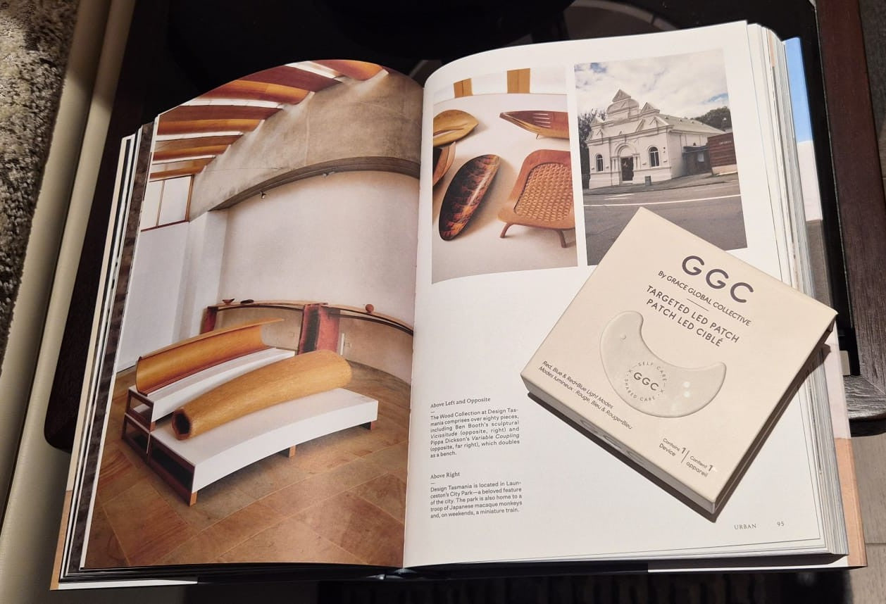 GGC packaging resting on an open design book